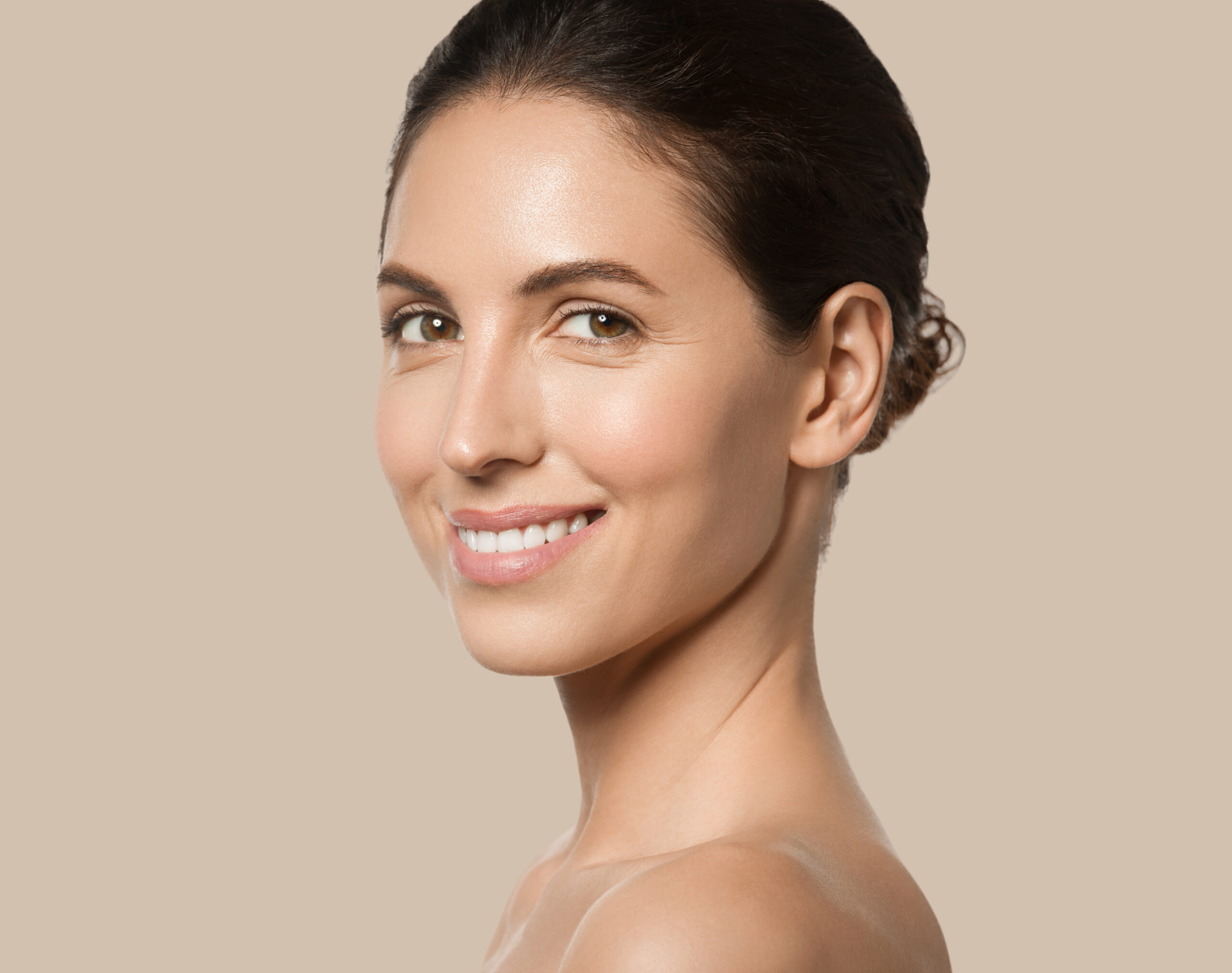 Skinboosters – Beautiful woman healthy skin beauty face cosmetic concept color background brown