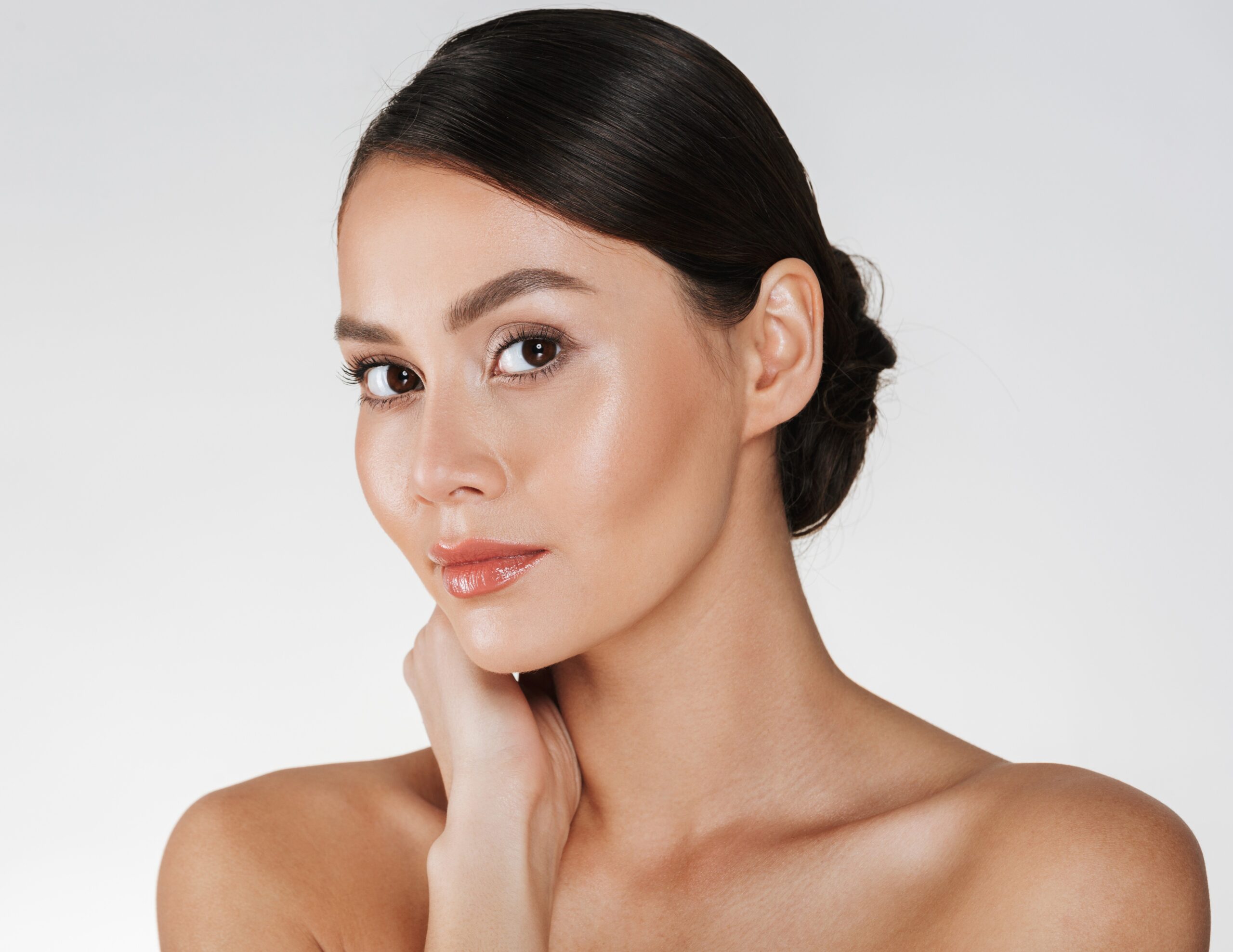 Polynucleotides – Beauty portrait charming caucasian woman with brown hair bun posing camera with beautiful look isolate