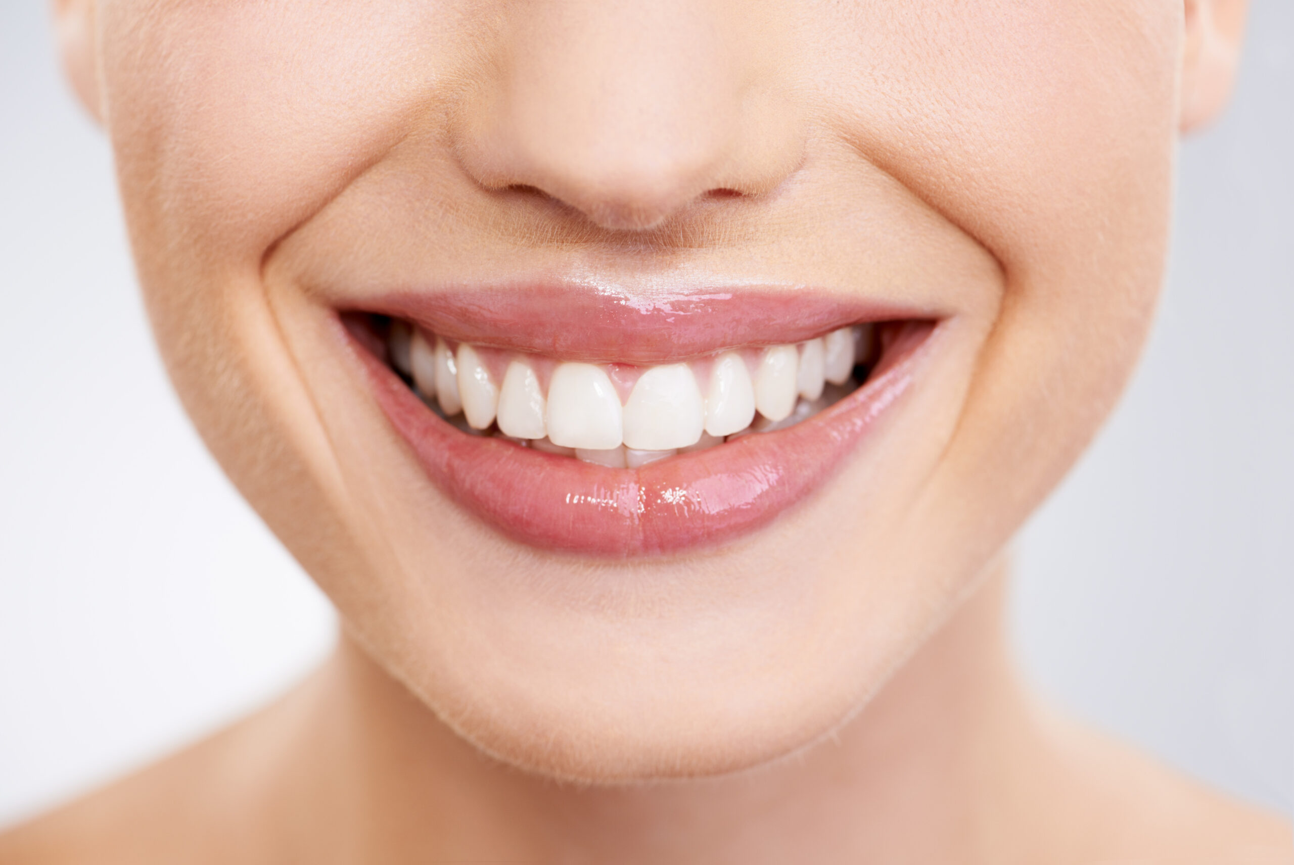 Beauty mouth teeth with woman closeup studio gray background dental care oral hygiene skincare smile orthodontics with h